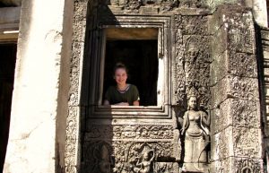 Family holidays in Cambodia - teenager exploring Angkor Wat