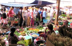 Cambodia family holidays - kids exploring market stalls