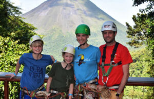 Family preparing to zip line at Arenal Volcano, Costa Rica