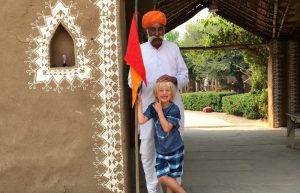 India family holiday - child with guard