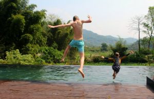 Nepal family holidays - kids jumping in a pool
