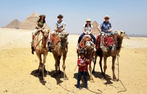 Egypt customer reviews - family riding camels at the Pyramids
