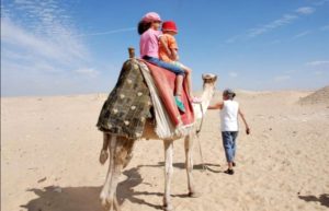 Egypt customer review - girls enjoying a camel ride