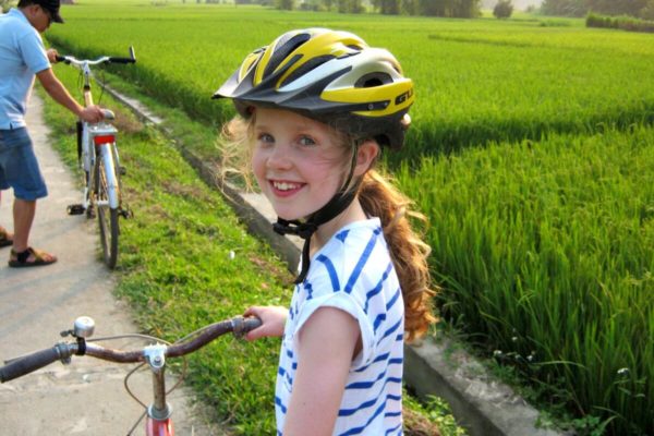 Young girl with bike in Vietnam - Family bike rides - family cycling holidays abroad