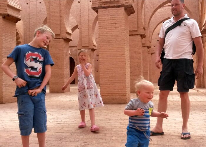 Father with kids on budget family holiday in Morocco