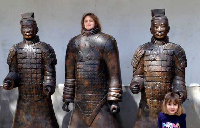 family summer holiday in china - kids posing with the terracotta warriors