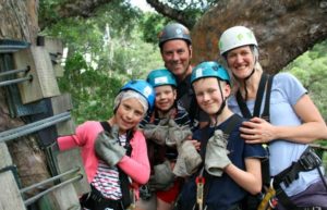 South Africa for families photo of family ready to go zip lining