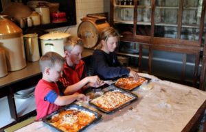 Kids making Pizza in Cape Town, South Africa for families itinerary