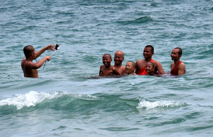 Cambodia photo blog - monks in sea taking a selfie!