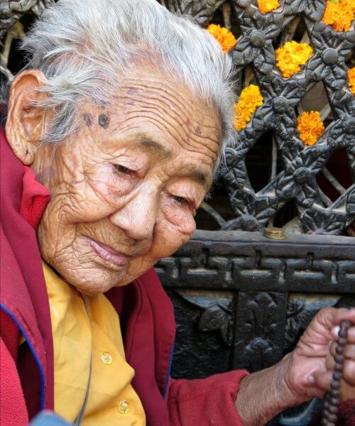 Nepal photo diary - old lady at Boudhanath Stupa