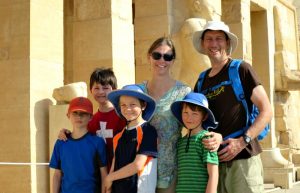 Family holiday packing list - family wearing sun hats