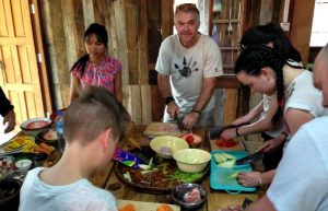 Family holiday tribe - cooking in Burma