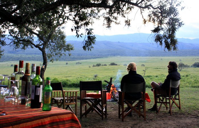 Sun downers around a camp fire - Kenya with kids holiday