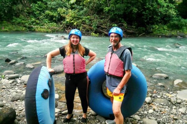 Self-driving in Costa Rica - Charlotte and her dad river tubing in Costa Rica