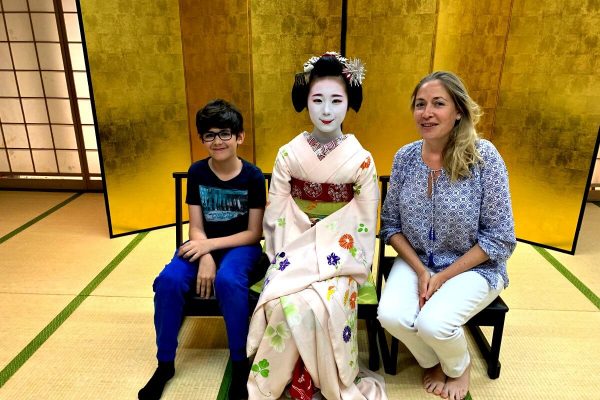 Mother and son with Geisha - Japan with kids itinerary