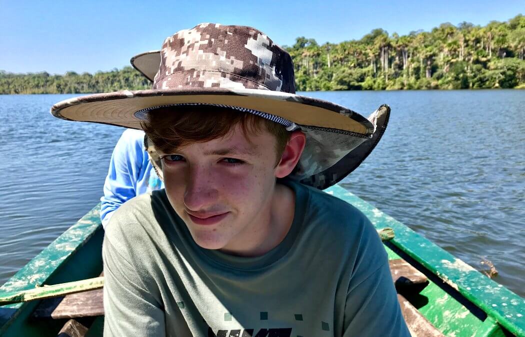 Boat in boat in Brazil on family adventure holiday