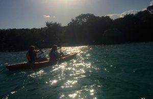Kayaking at sunset - Mexico with kids itinerary