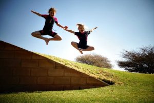 Sisters jumping against the sky line - Young Photographers Competition 2019