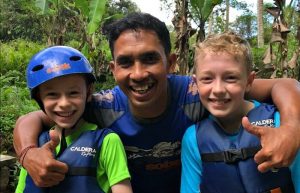 Boys going canyoning in Bali - family travel trends 2020