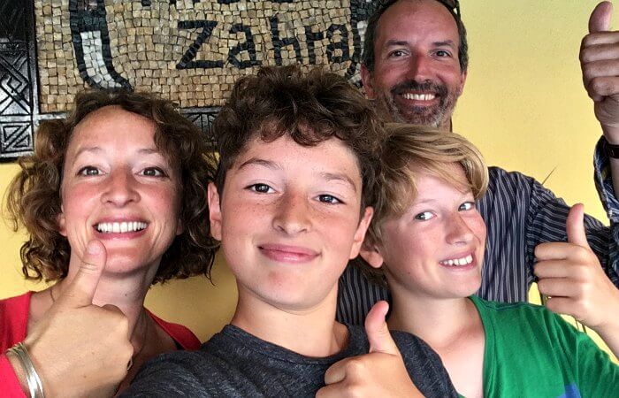 Family group with thumbs up in Morocco - Family travel