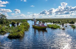 Family on boat trip in Ibera Wetlands - where to stay in Argentina