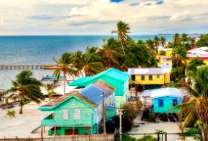 Photo for Belize itineraries of brightly coloured wooden houses by the beach