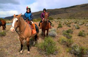 Family horse riding in Argentina on Patagonia with kids holiday