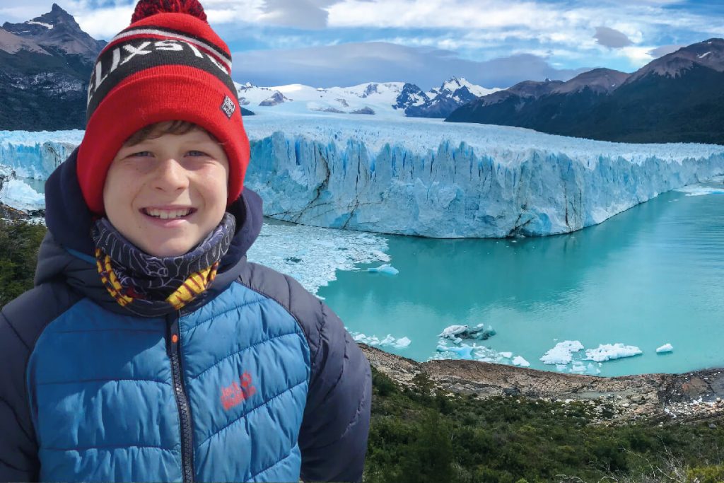 Patagonia with kids - child in front of glacier