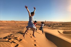 October half term holidays - photo of family in North African dunes