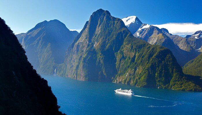 Boat in Milford Sound Fiordland by Rob Suisted