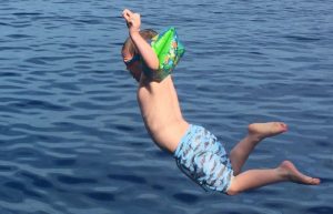 Croatia Customer reviews - child jumping into the sea