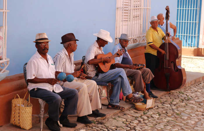 Listen to Cuban musicians on family adventure holiday in Cuba