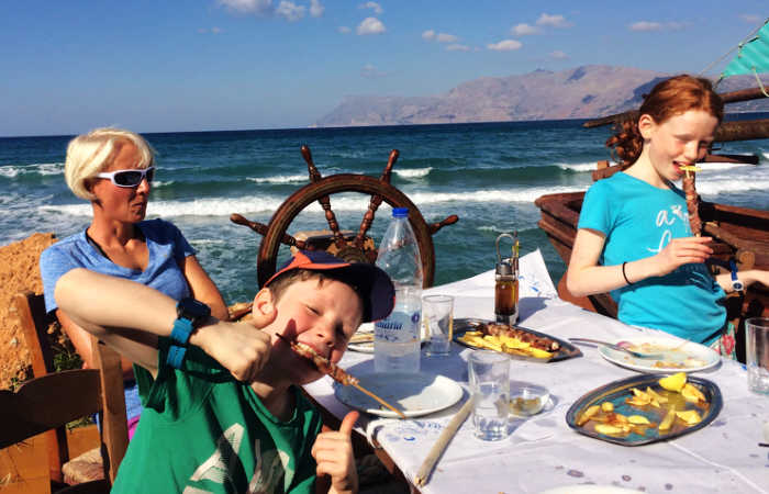 Greece itineraries for families - lunch on the beach in Crete