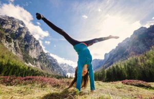 Handstand with stunning mountain backdrop