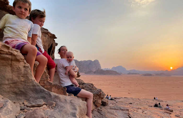 Family enjoying the sunset in Wadi Rum - Stubborn Mule Travel - Easter family holiday