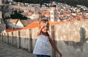 Girl in Dubrovnik on the old town walls - multi-generation holidays in Croatia