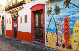 Funchal street with art and old style doors, on Madeira family holiday