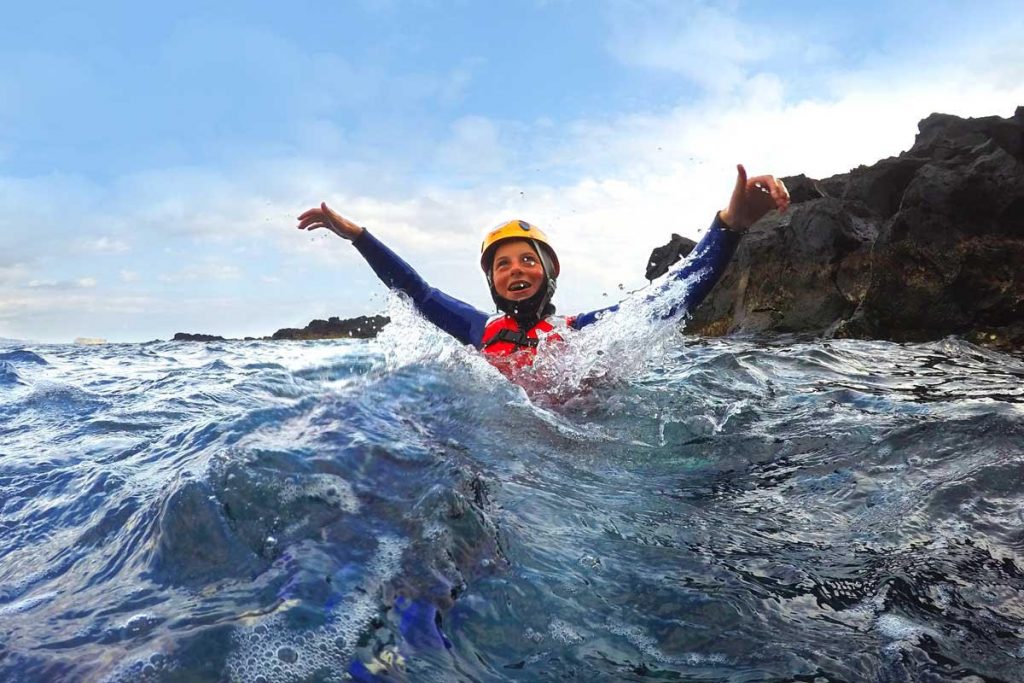 Azores family holidays - young women coasteering
