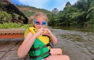 Thailand, child on a raft