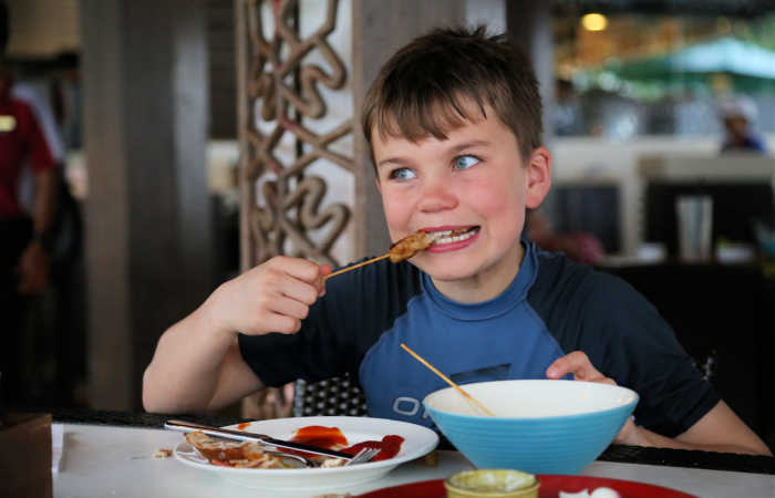 Child eating in a Borneo restaurant