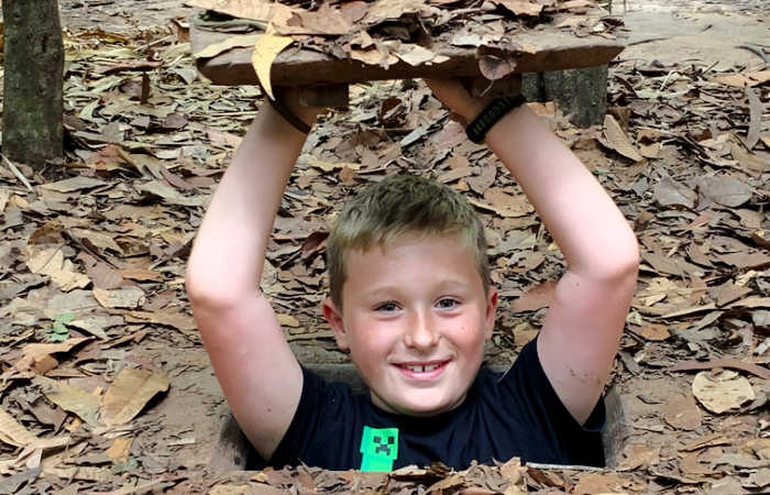 Crawl through the Cu Chi tunnels on a Vietnam with kids itinerary