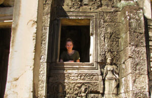 Cambodia -Angkor Wat. Family explore ruins