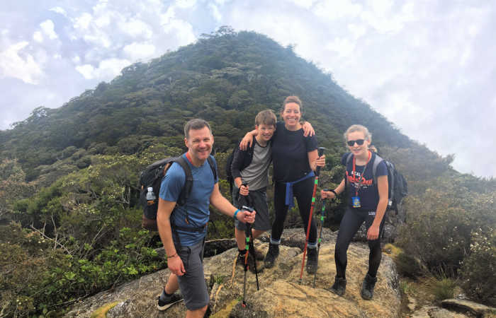 Teens hiking in Borneo on family holiday