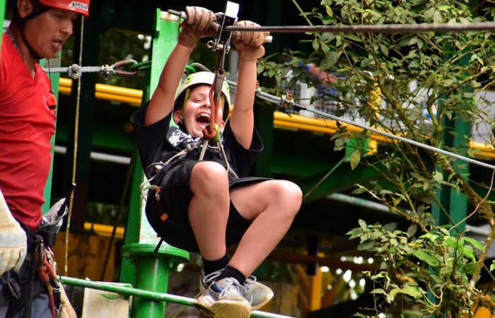 Boy zip lining in Costa Rica