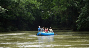 Photo of family on a river float in Costa Rica
