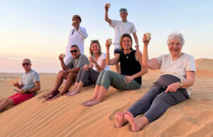 Multi-generational family trip into Omani dunes