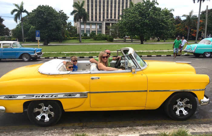 Exploring Havana in an open top car, best cities for kids