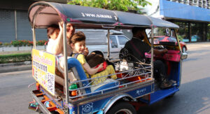 Getting about in a tuk tuk. Photos of Thailand
