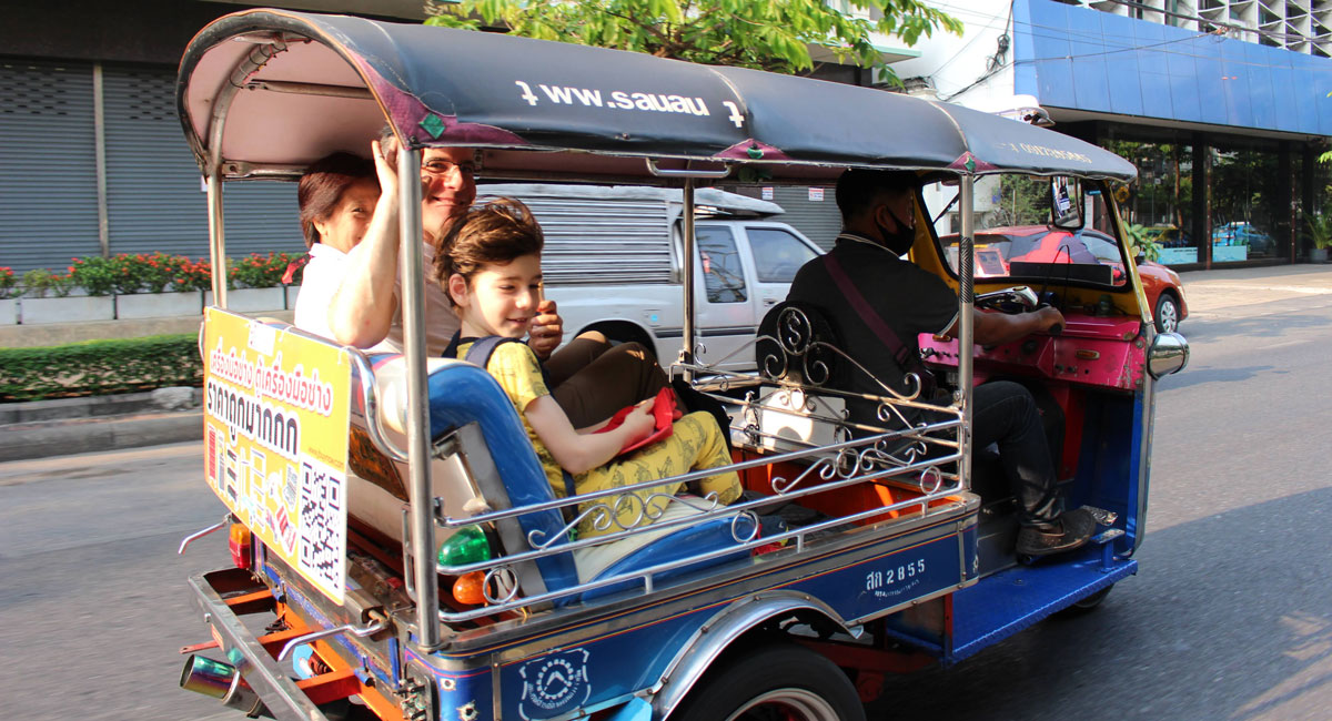Getting about in a tuk tuk. Photos of Thailand