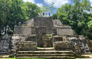 Family on Belize with kids holiday exploring Lamanai Mayan ruins